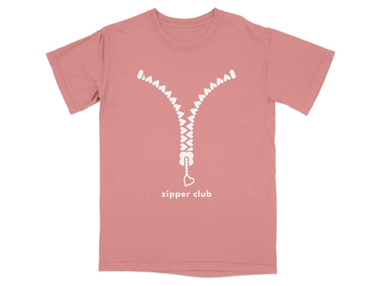 Salmon t-shirt with a white zipper graphic and "zipper club" text.