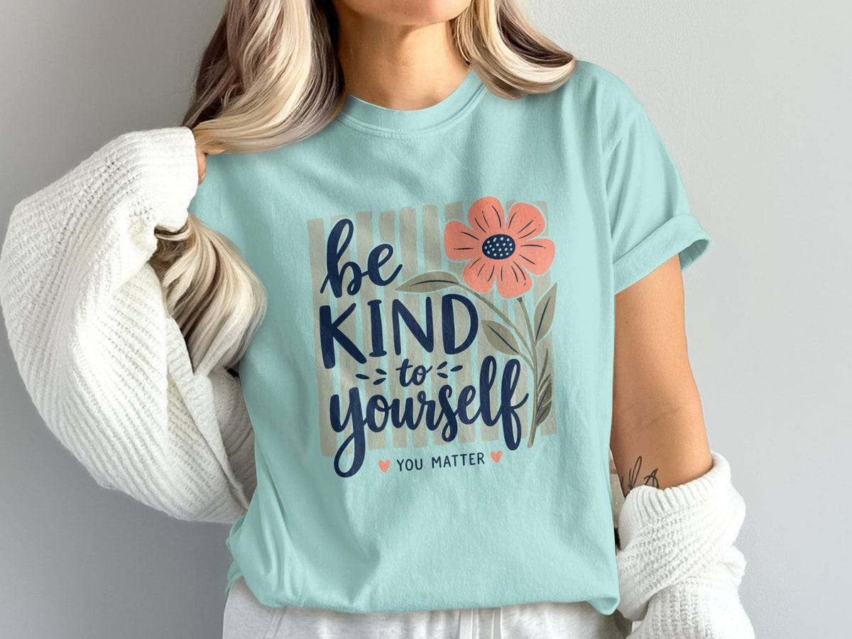 Mint t-shirt with "Be Kind To Yourself, You Matter" floral design.