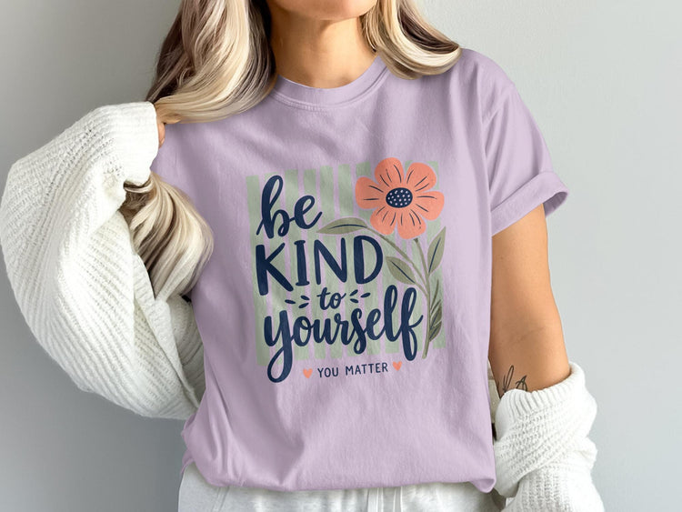 Purple t-shirt with "Be Kind to Yourself You Matter" text and floral design.