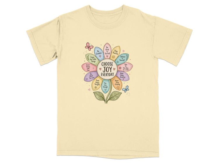 T-shirt with a flower design listing phrases like "Choose Joy Everyday" and "Be Yourself".