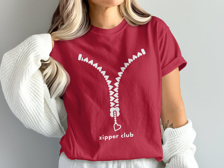 Red t-shirt with a white zipper design and "zipper club" text.