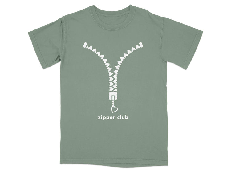 Green t-shirt with white zipper graphic and "zipper club" text.