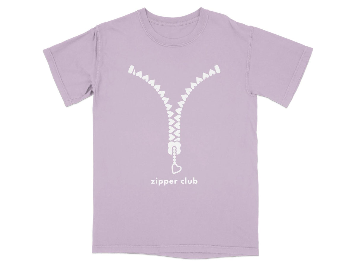 Purple t-shirt with a white zipper graphic and "zipper club" text.