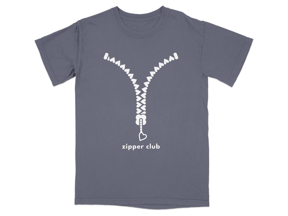 Mauve t-shirt with white zipper graphic and "zipper club" text.