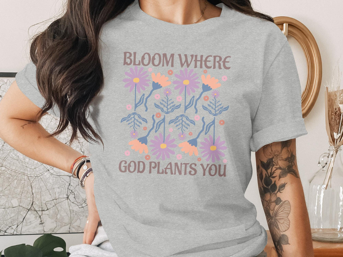 Grey t-shirt with "Bloom Where God Plants You" text and floral design.