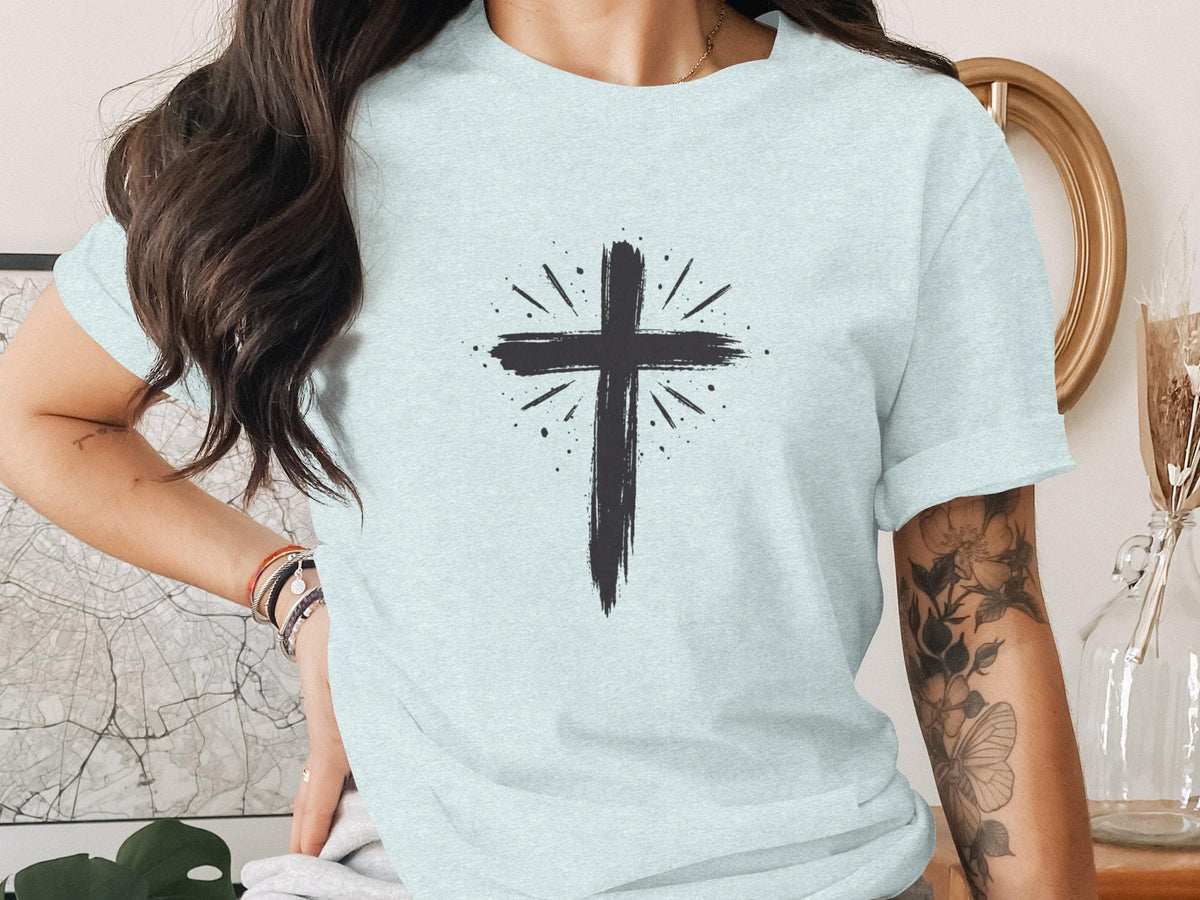 Light blue t-shirt with a distressed black cross graphic.