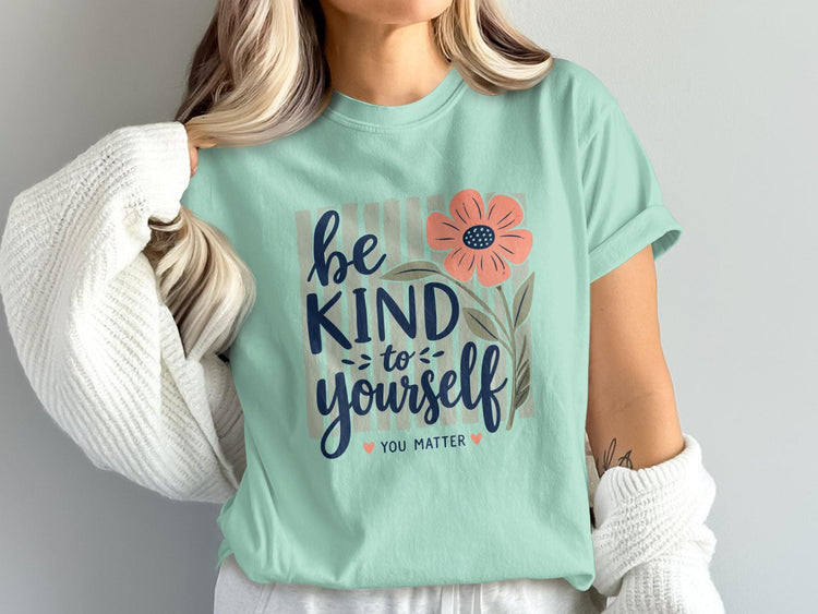 Mint t-shirt with floral design and "be kind to yourself you matter" text.