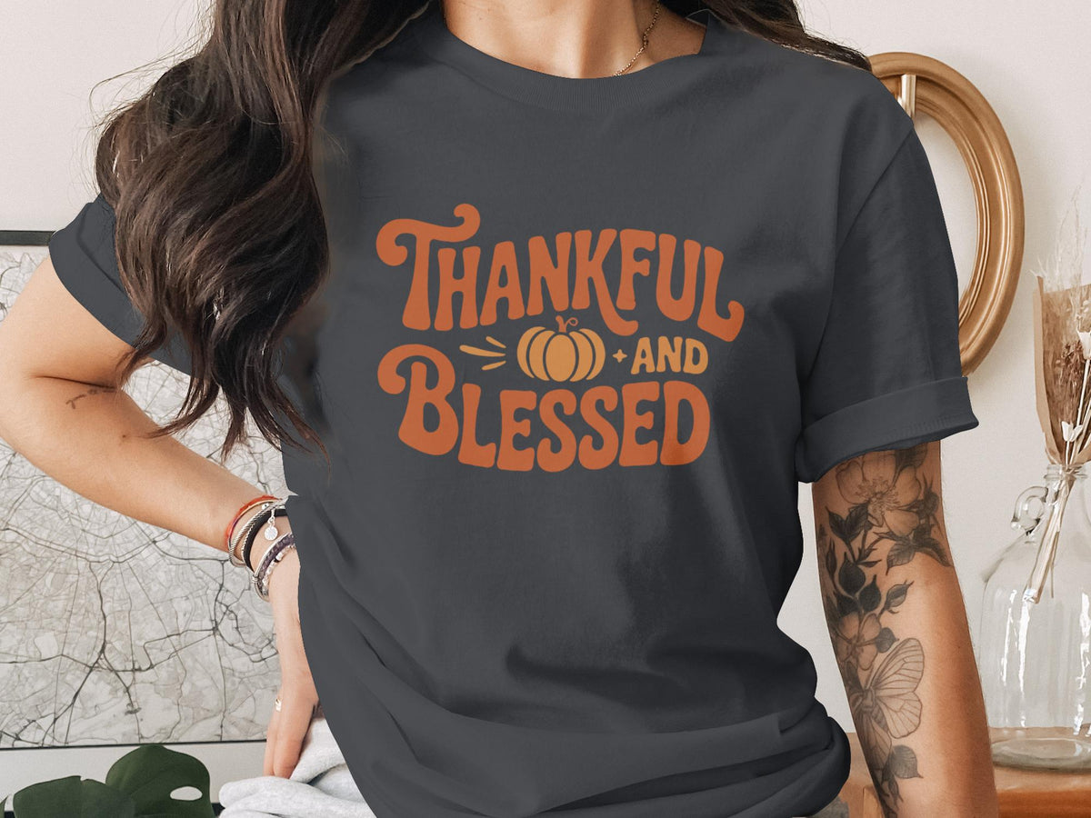 Dark grey t-shirt with "Thankful and Blessed" and a pumpkin graphic.