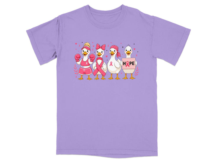 Four ducks in pink gear with breast cancer ribbons, one holding a HOPE sign.
