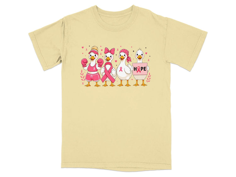Four cartoon ducks with breast cancer awareness ribbons hold boxing gloves and a sign with HOPE.
