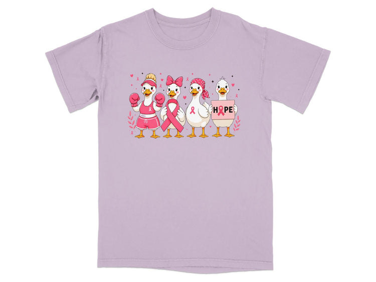 Four cartoon ducks in pink attire with breast cancer awareness symbols, one holding a sign saying HOPE.