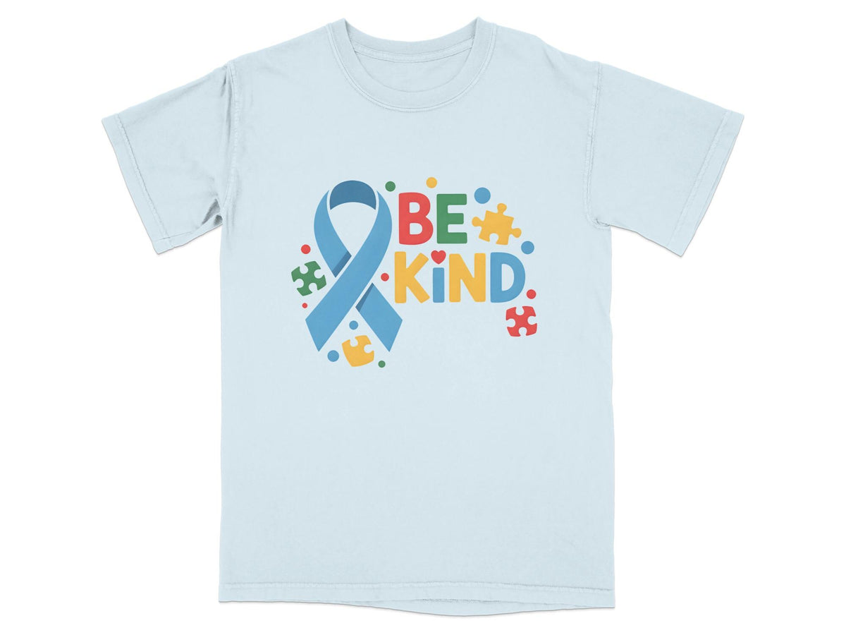 Light blue t-shirt with "BE KIND" text and puzzle pieces.