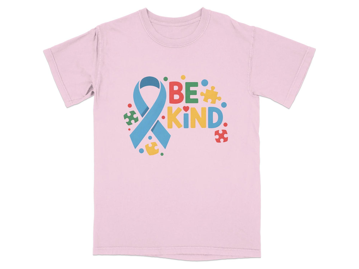 Pink t-shirt with blue ribbon and "BE KIND" text with puzzle pieces.