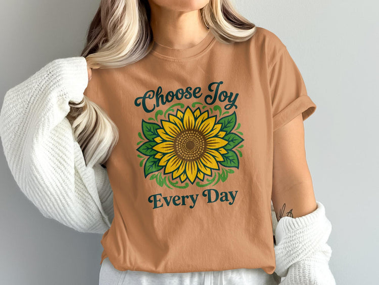 T-shirt with a sunflower graphic and text "Choose Joy Every Day".