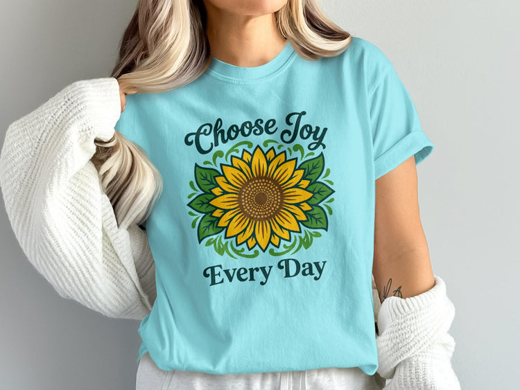 Light blue t-shirt with a sunflower and text "Choose Joy Every Day".