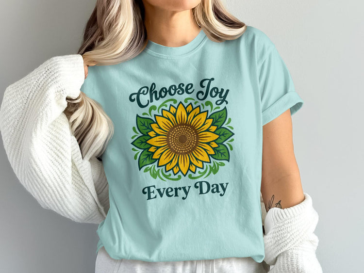 Light blue t-shirt with a sunflower design and the text "Choose Joy Every Day".