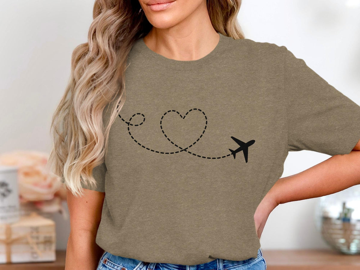 T-shirt with black airplane and dashed heart-shaped flight path graphic.
