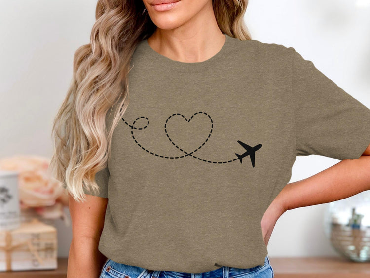 T-shirt with black airplane and dashed heart-shaped flight path graphic.