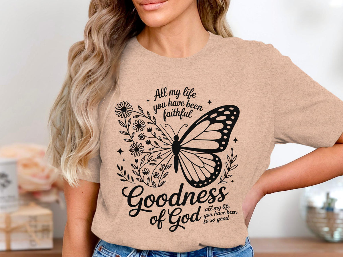 Shirt with butterfly and floral graphic reading "Goodness of God" and "All my life you have been so so good."
