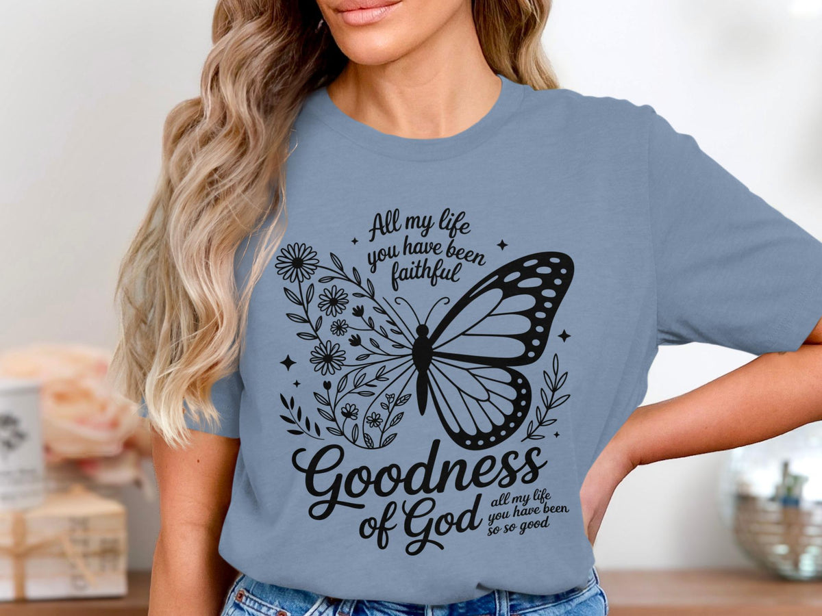 T-shirt with butterfly and floral graphic with text "Goodness of God".
