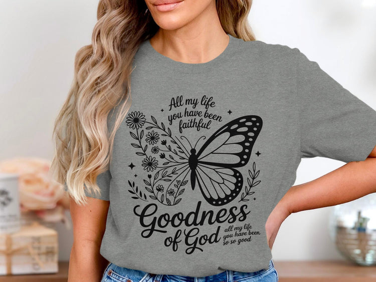 Grey t-shirt with black butterfly and floral graphic, "Goodness of God" text.