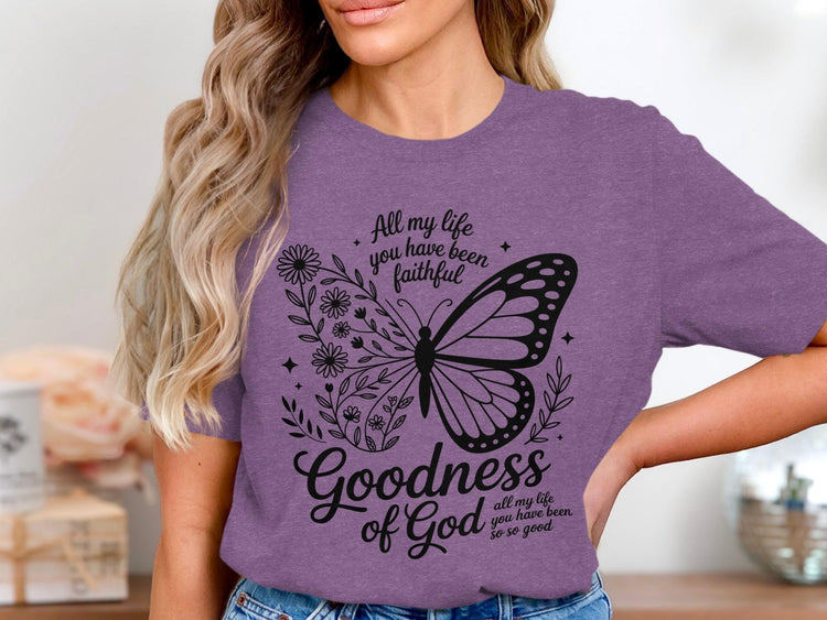 Purple t-shirt with butterfly graphic and text "Goodness of God".