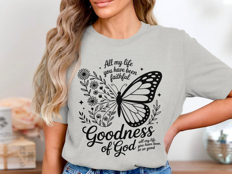 Gray t-shirt with black floral and butterfly graphic with text: Goodness of God.
