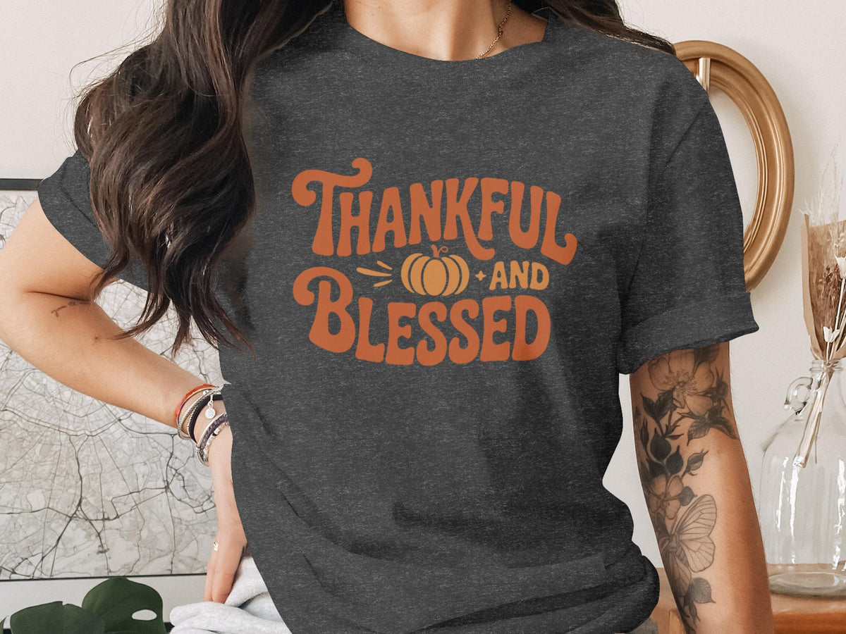Dark gray t-shirt with "Thankful and Blessed" text and a pumpkin graphic.