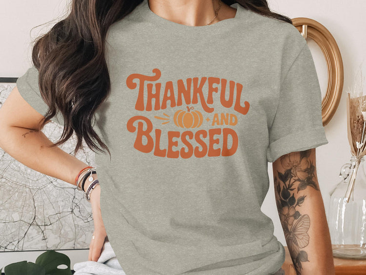 Gray t-shirt with "Thankful and Blessed" text and a pumpkin graphic.