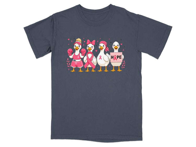Four ducks in pink, one with boxing gloves, holding a "HOPE" sign.