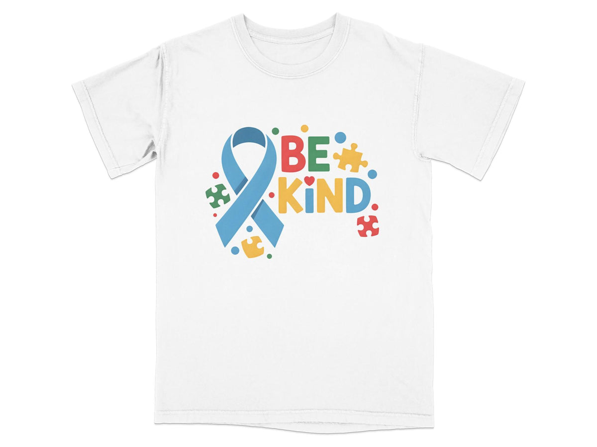 White t-shirt with "BE KIND" text, blue ribbon, and colorful puzzle pieces.