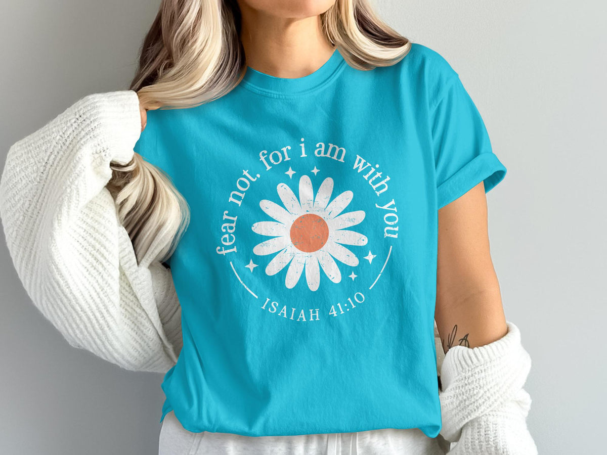 Teal t-shirt with white daisy graphic and text "fear not, for I am with you Isaiah 41:10".