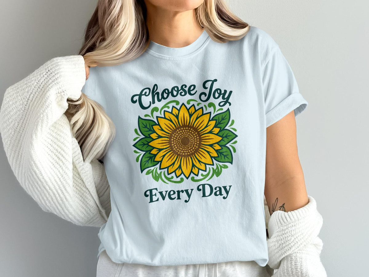 Light blue t-shirt with sunflower graphic and text "Choose Joy Every Day."