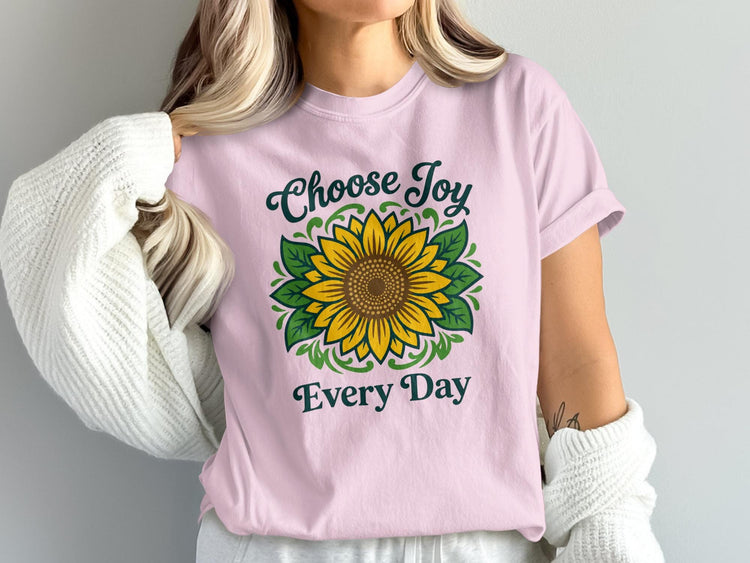 Pink t-shirt with sunflower graphic and "Choose Joy Every Day" text.