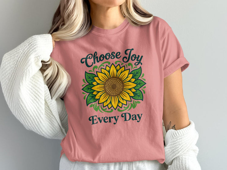 Pink t-shirt with sunflower graphic and text "Choose Joy Every Day"