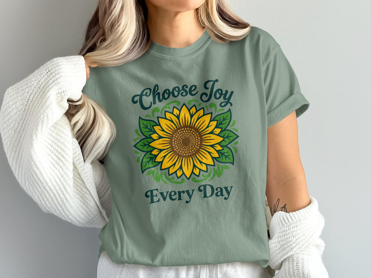Green t-shirt with a sunflower graphic and the text "Choose Joy Every Day".