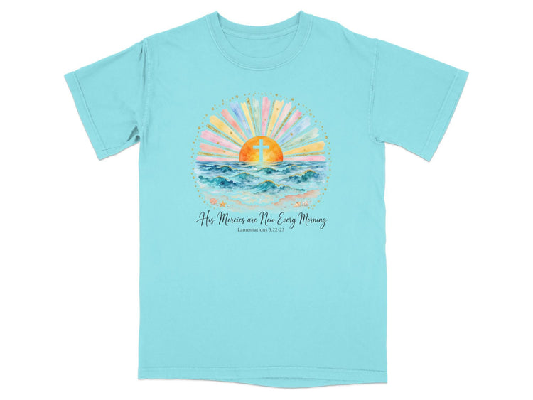 Aqua t-shirt with watercolor sunrise, cross, ocean waves, and "His Mercies are New Every Morning" text.