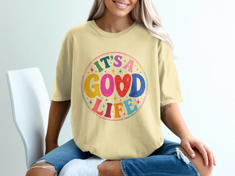 T-shirt with colorful "IT'S A GOOD LIFE" text and stars in a circular design.