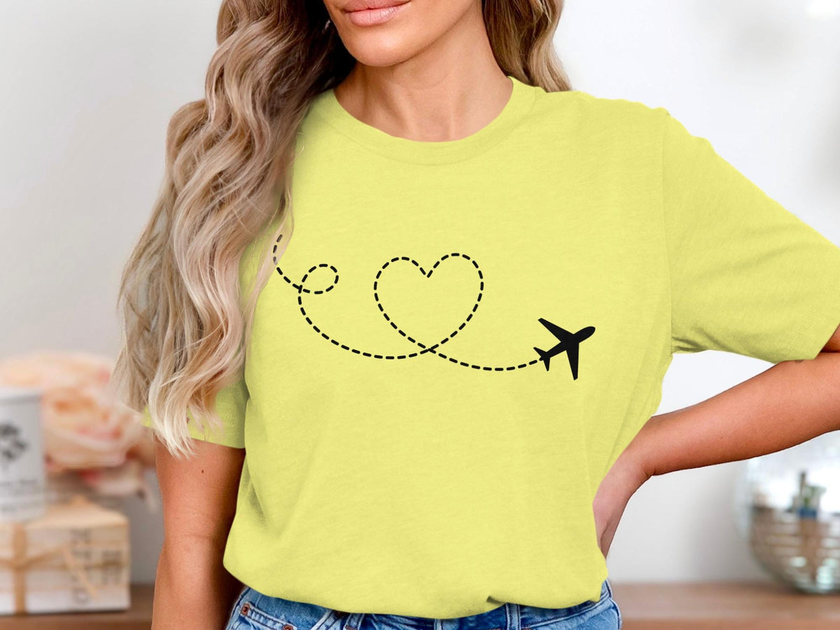Yellow t-shirt with black airplane flight path in heart shape design.