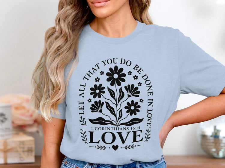 Light blue t-shirt with "Let All That You Do Be Done In Love" and 1 Corinthians 16:14.