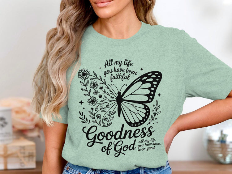 Light green t-shirt with butterfly, flowers, and the text "Goodness of God".