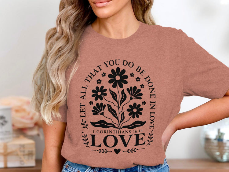 T-shirt with "Let All That You Do Be Done In Love" and bible verse.