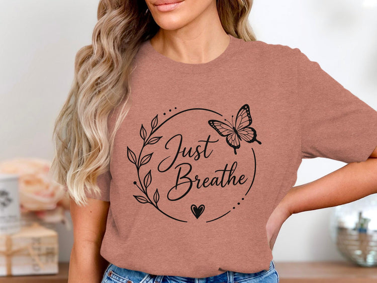T-shirt with "Just Breathe" text and a butterfly design.