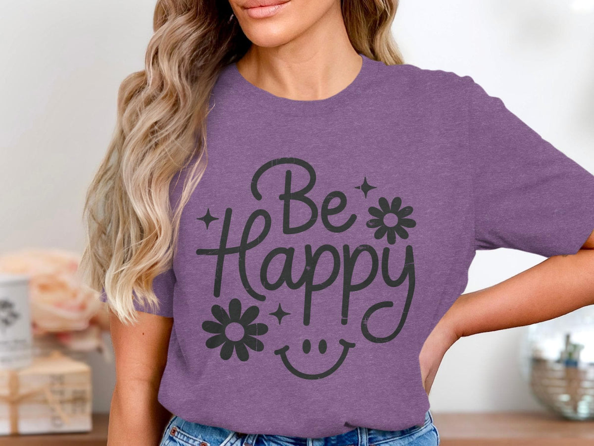 Purple t-shirt with distressed black text "Be Happy" and smiley face graphic.