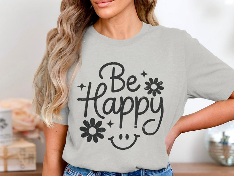Light grey t-shirt with black "Be Happy" text and smiley face graphic.