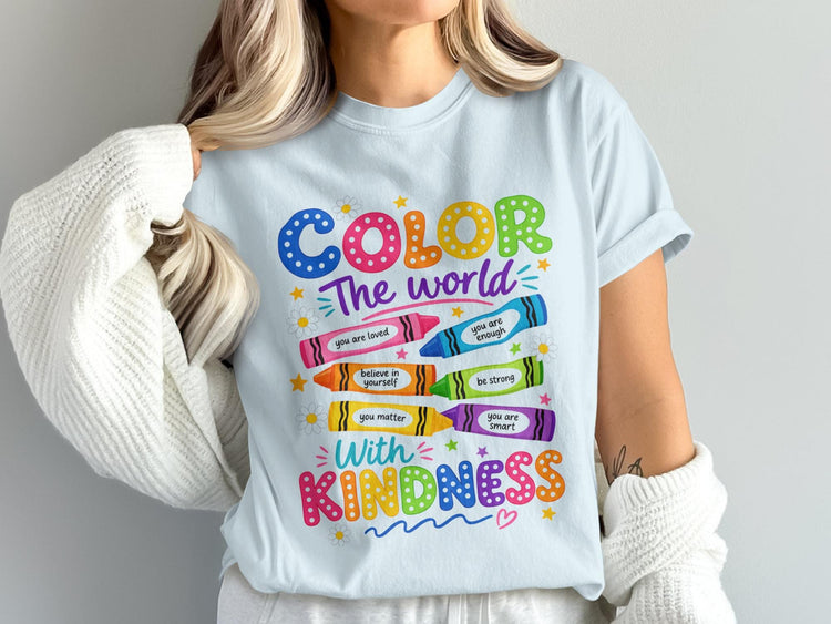 Light blue t-shirt with "COLOR The world With KINDNESS" and crayon graphics.