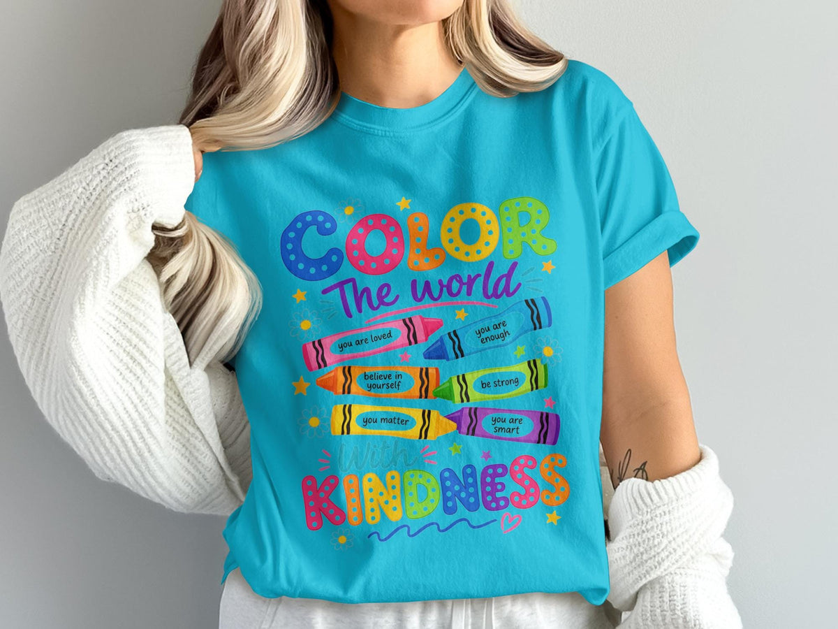 Turquoise t-shirt with "COLOR The world with KINDNESS" and inspirational crayon messages.