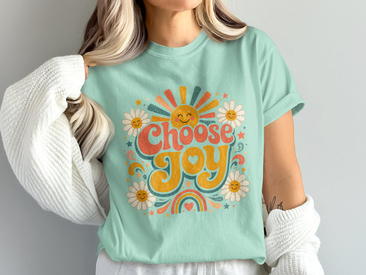 Mint t-shirt with "Choose Joy" text, smiling sun, and daisy graphics.