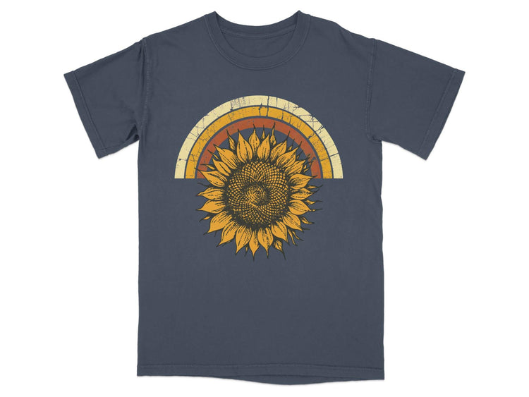 Dark blue t-shirt with a vintage-style sunflower and rainbow graphic.