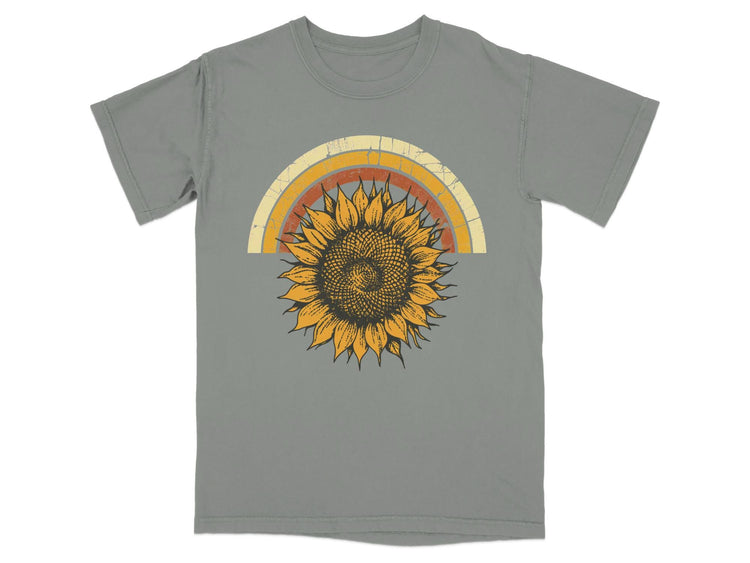 Gray t-shirt with a distressed sunflower and arched rainbow graphic.